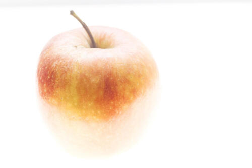 Ein Apfel mit hellen Hintergrund